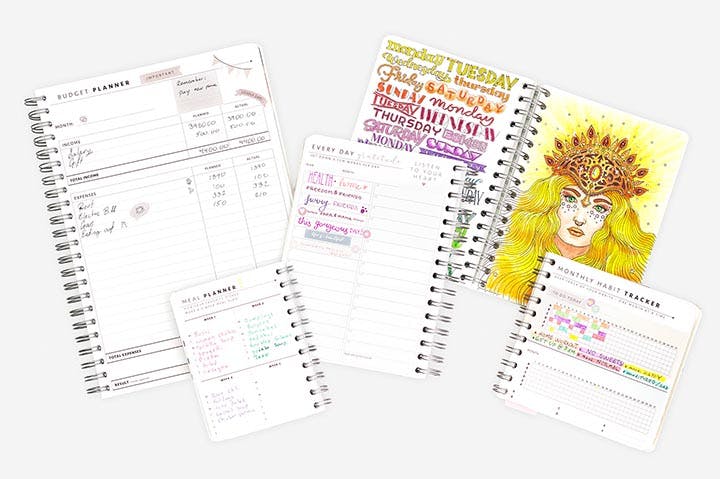 A meal planner, year overviews, maps and travel journal, coloring pages